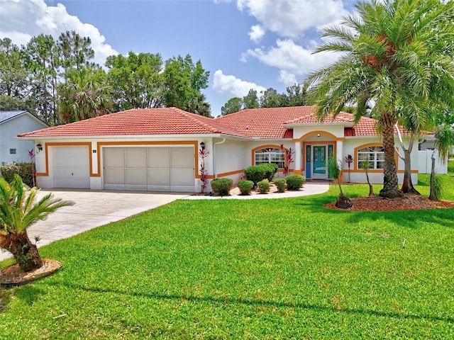 118 Pine Grove Dr, Palm Coast, FL 32164 - mediterranean / spanish-style home with a tiled roof, an attached garage, stucco siding, driveway, and a front yard