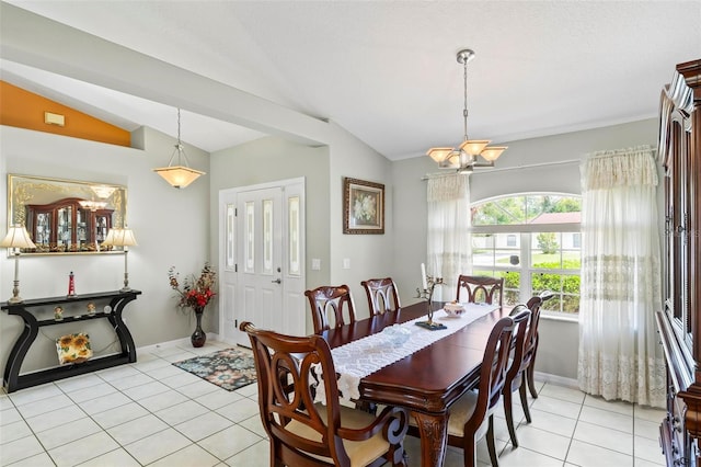 118 Pine Grove Dr, Palm Coast, FL 32164 - dining space featuring lofted ceiling, a chandelier, light tile patterned flooring, and baseboards