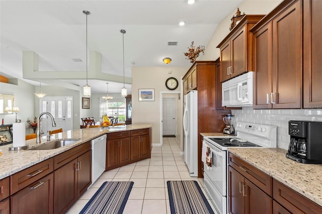 118 Pine Grove Dr, Palm Coast, FL 32164 - kitchen with white appliances, a sink, light tile patterned floors, tasteful backsplash, and light stone countertops