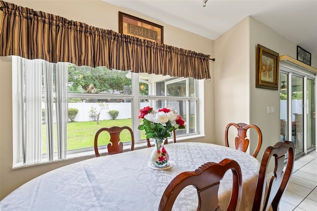 118 Pine Grove Dr, Palm Coast, FL 32164 - dining area with tile patterned flooring and plenty of natural light