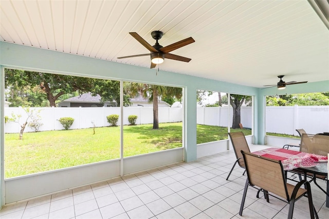 118 Pine Grove Dr, Palm Coast, FL 32164 - sunroom / solarium featuring a ceiling fan and plenty of natural light