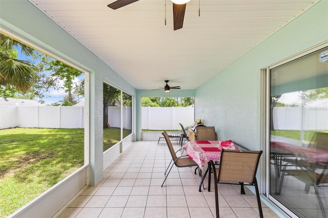 118 Pine Grove Dr, Palm Coast, FL 32164 - sunroom featuring ceiling fan, lofted ceiling, and healthy amount of natural light