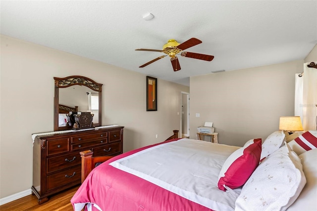 118 Pine Grove Dr, Palm Coast, FL 32164 - bedroom featuring light wood-style flooring and a ceiling fan