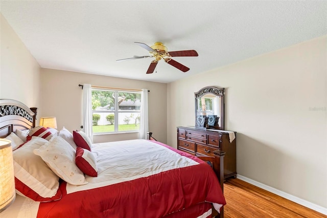 118 Pine Grove Dr, Palm Coast, FL 32164 - bedroom featuring light wood-type flooring, baseboards, and ceiling fan