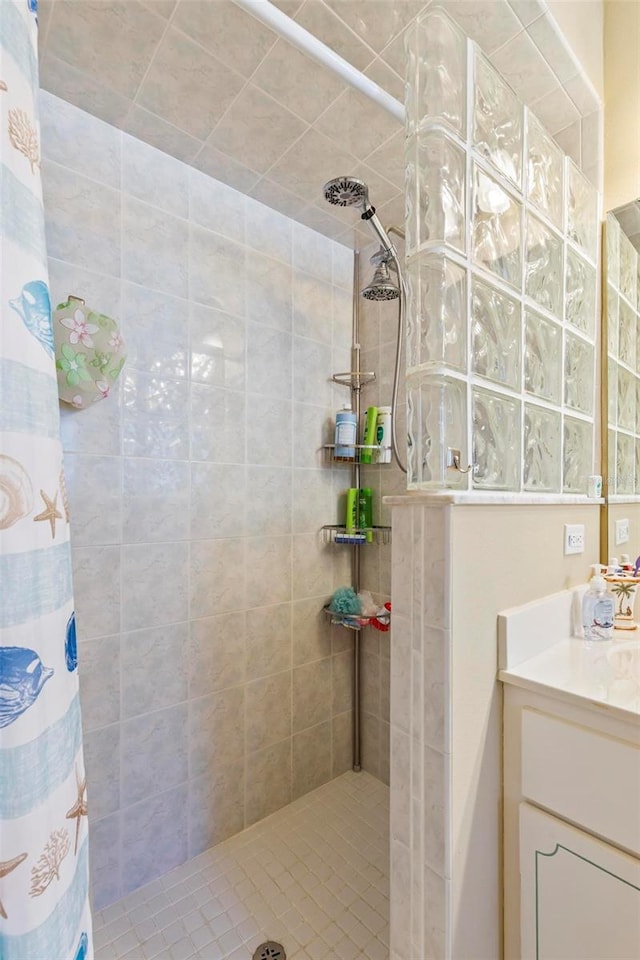 118 Pine Grove Dr, Palm Coast, FL 32164 - full bathroom with a tile shower and vanity
