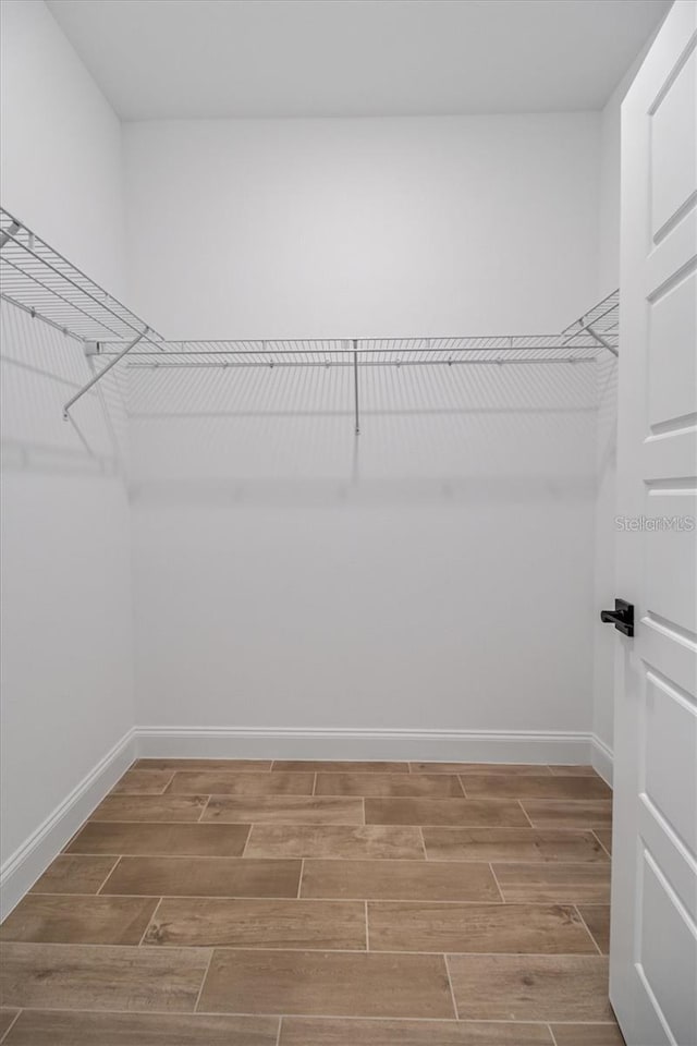 2 Seamanship Trl, Palm Coast, FL 32164 - spacious closet featuring wood finished floors