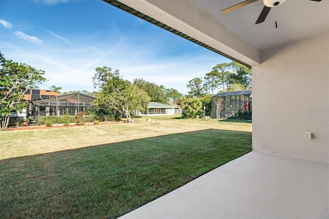 2 Seamanship Trl, Palm Coast, FL 32164 - view of grassy yard with ceiling fan and a lanai