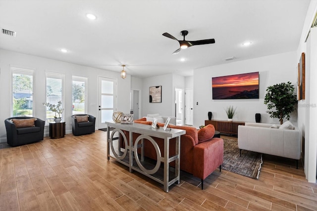 2 Seamanship Trl, Palm Coast, FL 32164 - living room featuring wood finished floors, ceiling fan, and recessed lighting