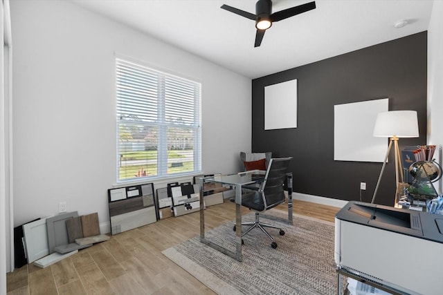 2 Seamanship Trl, Palm Coast, FL 32164 - home office featuring ceiling fan, light wood-style flooring, and baseboards