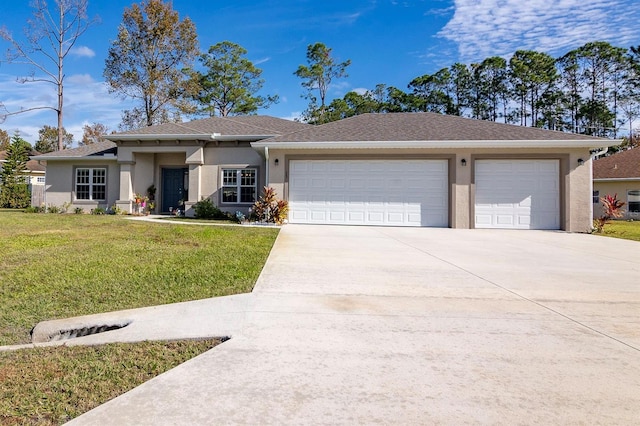 15 Raleigh Dr, Palm Coast, FL 32164 - view of front of property with an attached garage, driveway, stucco siding, and a front yard