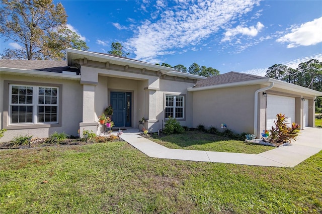 15 Raleigh Dr, Palm Coast, FL 32164 - view of front of house featuring an attached garage, stucco siding, a front lawn, and a shingled roof