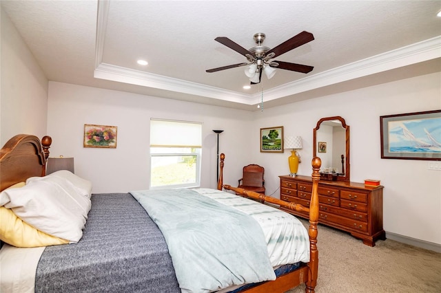 15 Raleigh Dr, Palm Coast, FL 32164 - bedroom with ornamental molding, light colored carpet, recessed lighting, a tray ceiling, and ceiling fan