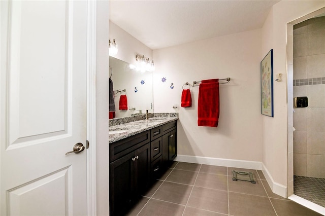 15 Raleigh Dr, Palm Coast, FL 32164 - bathroom with double vanity, tile patterned flooring, and a walk in shower