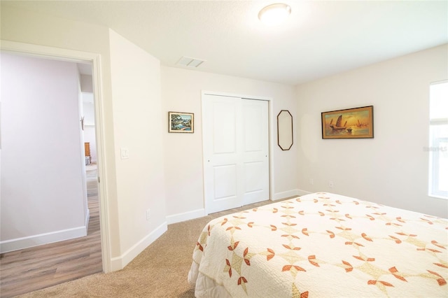 15 Raleigh Dr, Palm Coast, FL 32164 - carpeted bedroom with a closet and baseboards