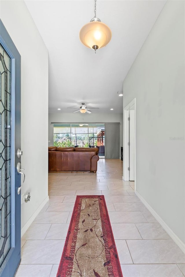 9 Port Royal Dr, Palm Coast, FL 32164 - entrance foyer featuring a ceiling fan and light tile patterned flooring