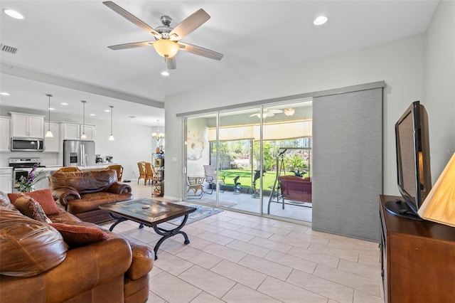 9 Port Royal Dr, Palm Coast, FL 32164 - living area with a ceiling fan, recessed lighting, and light tile patterned floors
