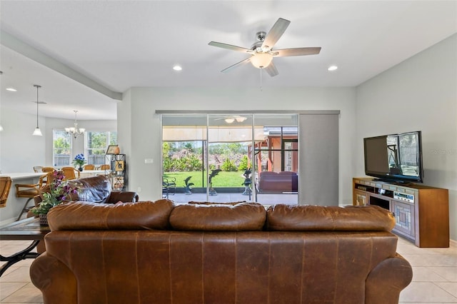 9 Port Royal Dr, Palm Coast, FL 32164 - living room with light tile patterned floors, ceiling fan, recessed lighting, and a chandelier