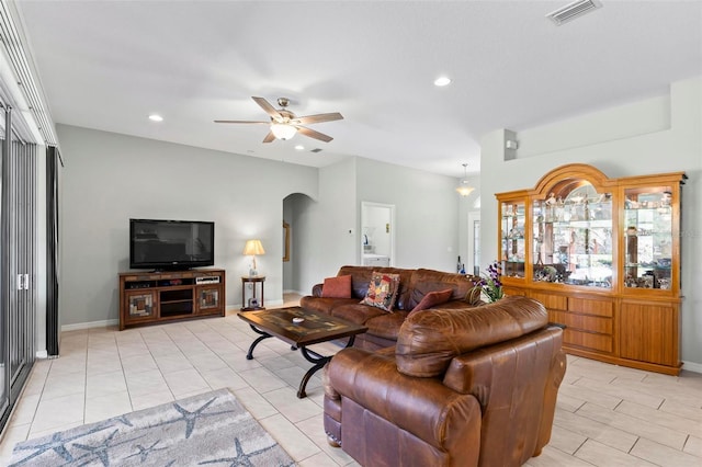 9 Port Royal Dr, Palm Coast, FL 32164 - living area featuring arched walkways, a ceiling fan, recessed lighting, and light tile patterned flooring