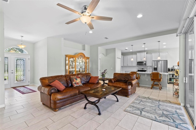9 Port Royal Dr, Palm Coast, FL 32164 - living area featuring a ceiling fan and recessed lighting