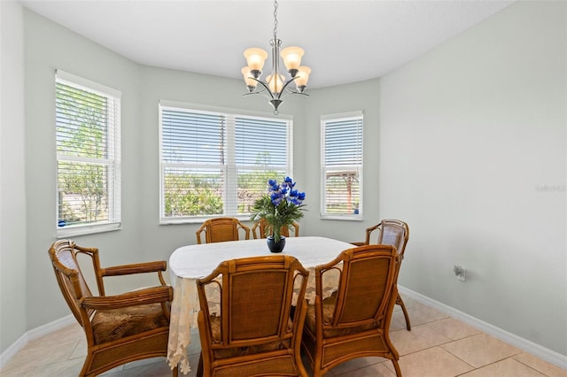 9 Port Royal Dr, Palm Coast, FL 32164 - dining space with a chandelier, plenty of natural light, and light tile patterned floors