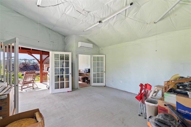 9 Port Royal Dr, Palm Coast, FL 32164 - sunroom with french doors, a wall mounted AC, and lofted ceiling