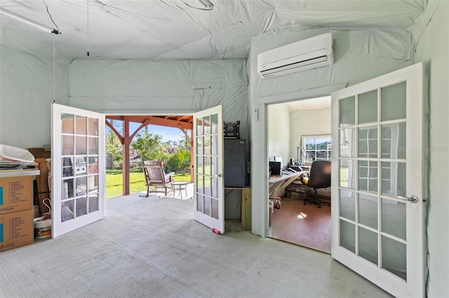 9 Port Royal Dr, Palm Coast, FL 32164 - doorway with french doors, a wall mounted AC, an office area, and carpet floors