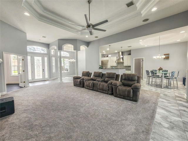 101 Covington Ln, Palm Coast, FL 32137 - living area featuring a chandelier, a raised ceiling, recessed lighting, crown molding, and ceiling fan