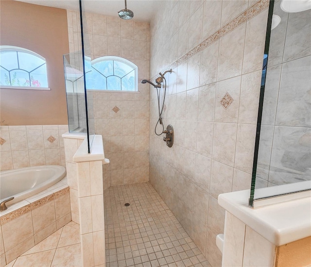 101 Covington Ln, Palm Coast, FL 32137 - bathroom with a garden tub, tiled shower, and tile patterned flooring