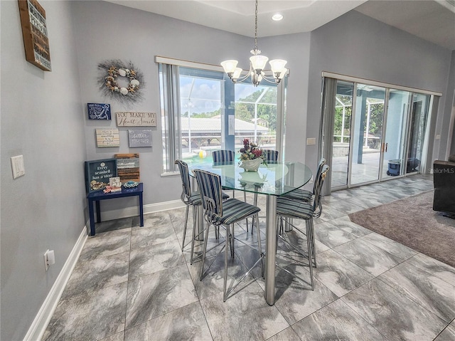101 Covington Ln, Palm Coast, FL 32137 - dining space featuring a chandelier, baseboards, and recessed lighting