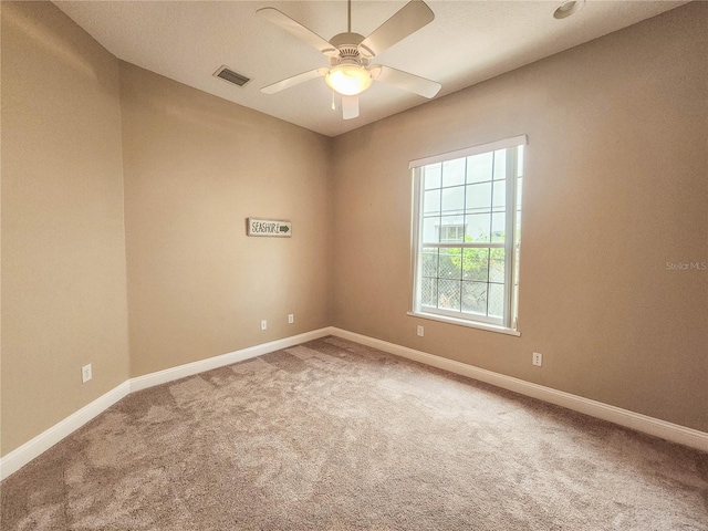 101 Covington Ln, Palm Coast, FL 32137 - empty room with carpet floors, ceiling fan, and baseboards