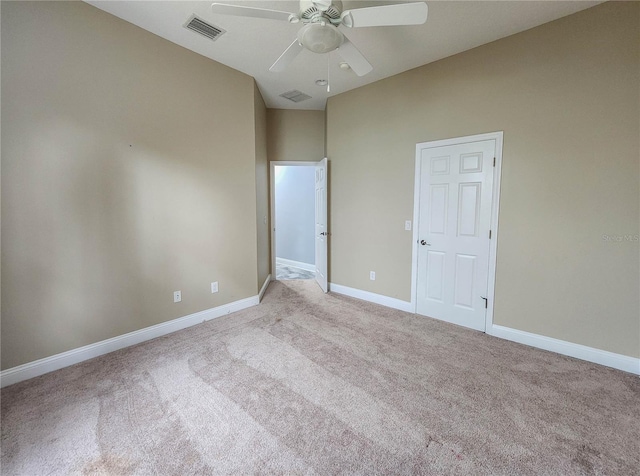 101 Covington Ln, Palm Coast, FL 32137 - unfurnished bedroom featuring carpet flooring, baseboards, ceiling fan, and a high ceiling