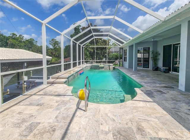 101 Covington Ln, Palm Coast, FL 32137 - view of swimming pool with a patio, a pool with connected hot tub, and glass enclosure