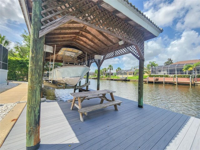 101 Covington Ln, Palm Coast, FL 32137 - dock area featuring boat lift and a water view
