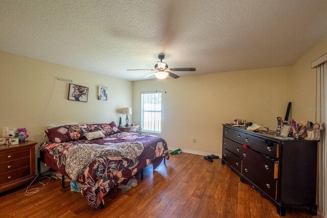 19 Rydell Ln, Palm Coast, FL 32164 - bedroom with wood finished floors, a ceiling fan, and a textured ceiling