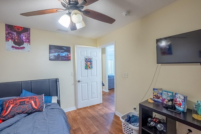 19 Rydell Ln, Palm Coast, FL 32164 - bedroom with light wood-style floors and ceiling fan