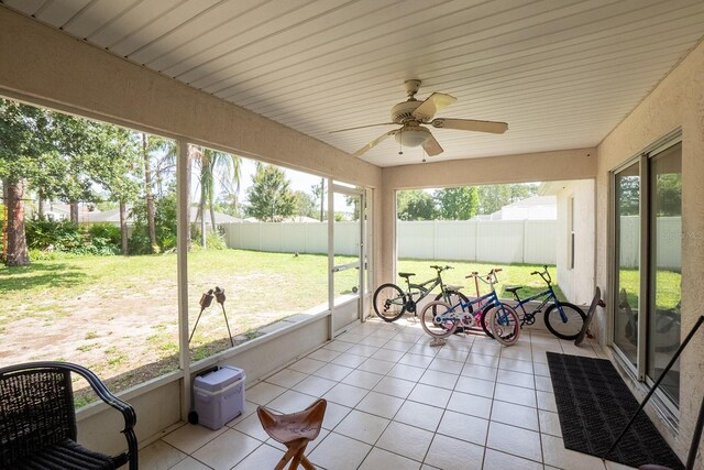 19 Rydell Ln, Palm Coast, FL 32164 - unfurnished sunroom featuring ceiling fan