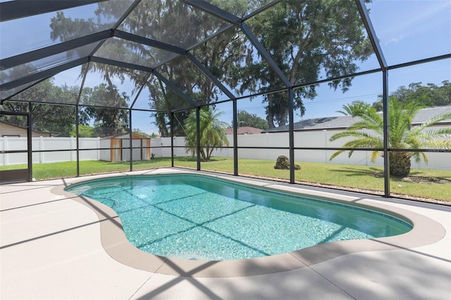 12 Fernwood Ln, Palm Coast, FL 32137 - view of pool featuring a patio, a fenced backyard, a storage shed, and glass enclosure