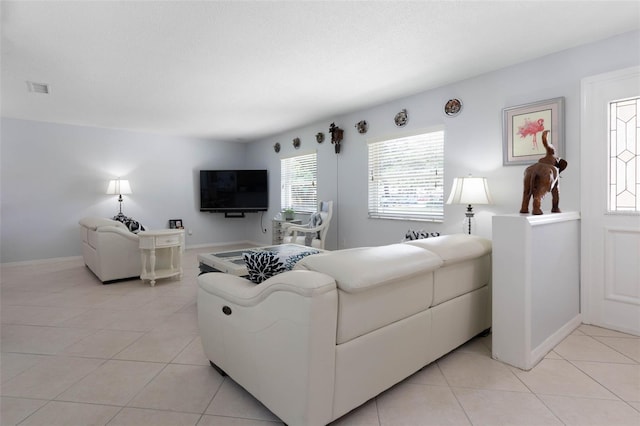 12 Fernwood Ln, Palm Coast, FL 32137 - living area featuring light tile patterned flooring