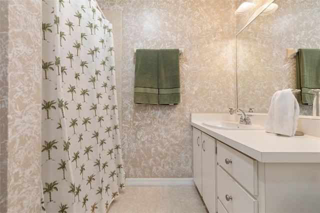 12 Fernwood Ln, Palm Coast, FL 32137 - full bathroom featuring vanity, wallpapered walls, and a shower with shower curtain