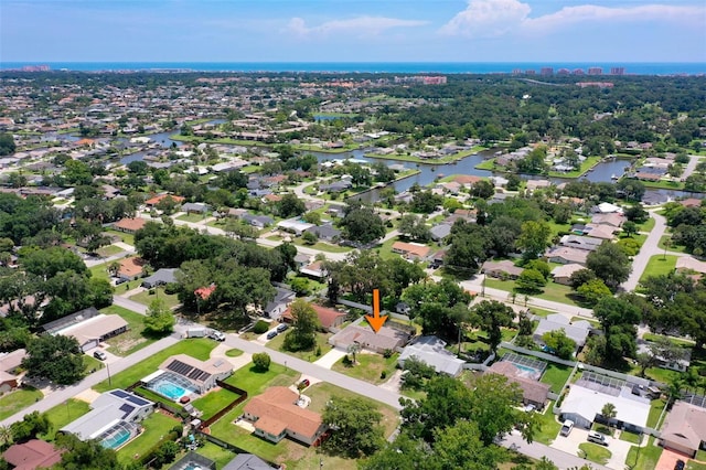 12 Fernwood Ln, Palm Coast, FL 32137 - aerial overview of property's location featuring a large body of water and nearby suburban area