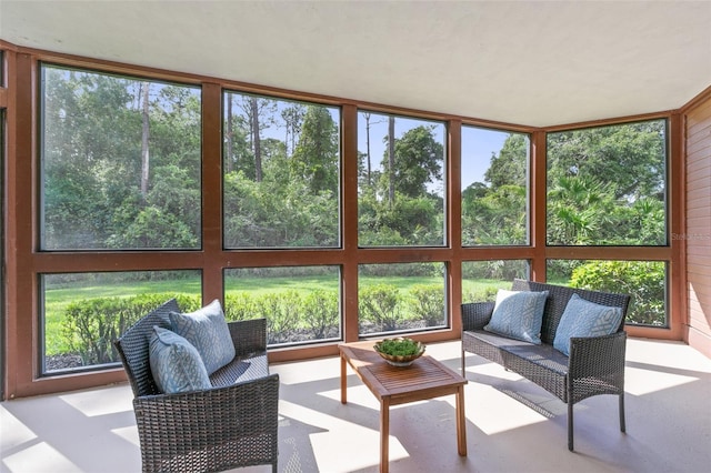 7 Sherbury Ct Unit 7, Palm Coast, FL 32137 - sunroom / solarium with healthy amount of natural light and an outdoor living space