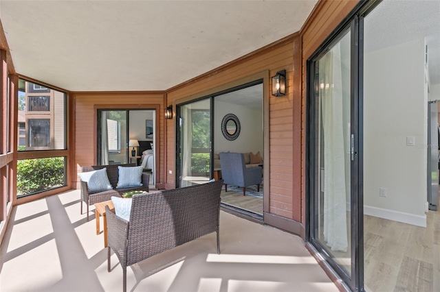 7 Sherbury Ct Unit 7, Palm Coast, FL 32137 - sunroom featuring healthy amount of natural light and an outdoor living space