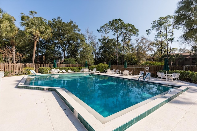 7 Sherbury Ct Unit 7, Palm Coast, FL 32137 - community pool featuring a patio area