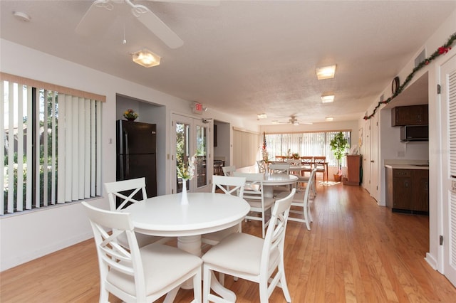 7 Sherbury Ct Unit 7, Palm Coast, FL 32137 - dining space with ceiling fan, light wood-style flooring, and baseboards