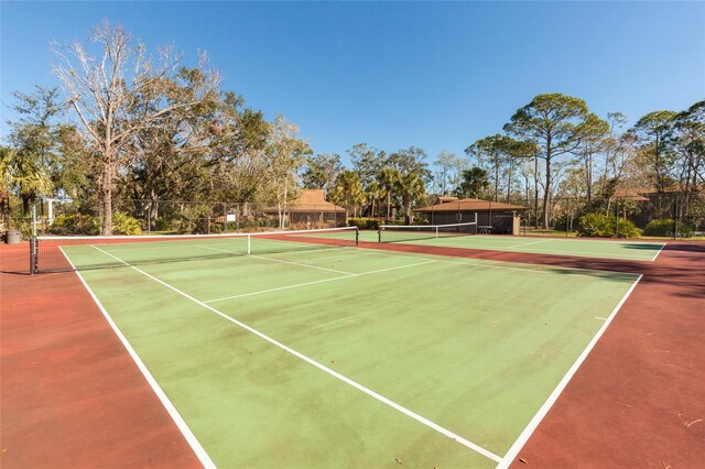 7 Sherbury Ct Unit 7, Palm Coast, FL 32137 - view of tennis court with community basketball court