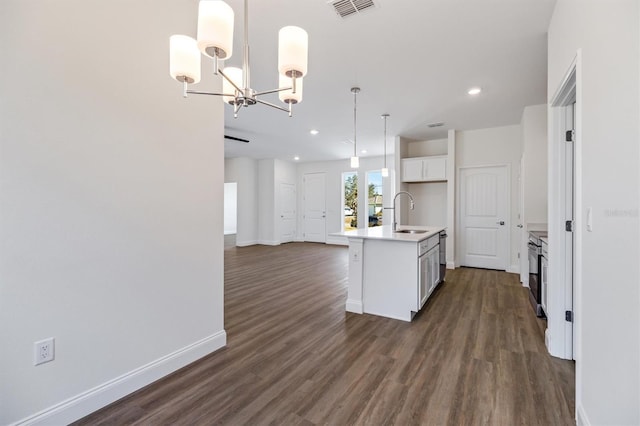 52 Pershing Ln, Palm Coast, FL 32164 - kitchen featuring dark wood-type flooring, a chandelier, open floor plan, white cabinetry, and light countertops