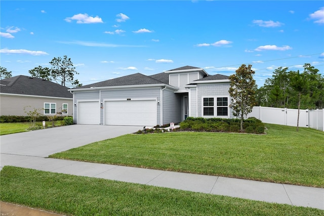 2137 Raglan Cir, Ormond Beach, FL 32174 - view of front of home with a garage and driveway