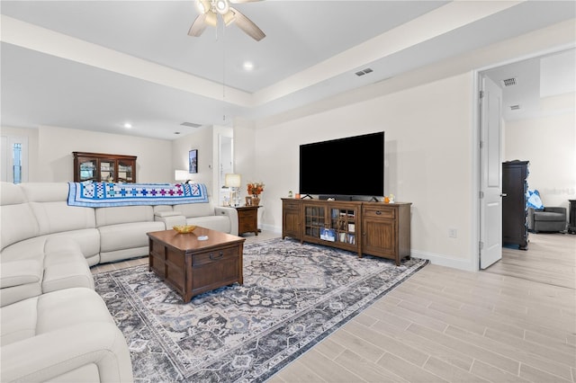 2137 Raglan Cir, Ormond Beach, FL 32174 - living room with a ceiling fan, wood finished floors, recessed lighting, and a raised ceiling