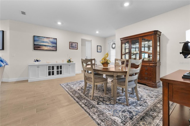 2137 Raglan Cir, Ormond Beach, FL 32174 - dining room with light wood-style floors and recessed lighting