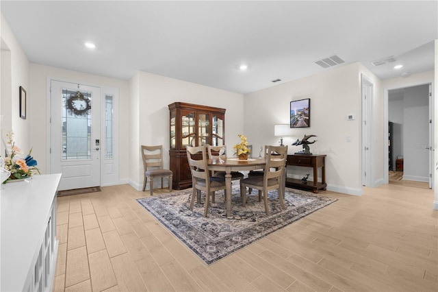 2137 Raglan Cir, Ormond Beach, FL 32174 - dining area with light wood-type flooring, healthy amount of natural light, and recessed lighting
